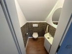 Toilette - 3-Zimmer Eigentumswohnung mit Garage, Stellplatz und eigenem Garten