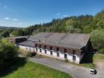Drohnenaufnahme ehemaliges Hotel - Attraktives Baugrundstück in Bestlage von Ransbach-Baumbach – Planungsvorschlag für 69 Wohneinheiten