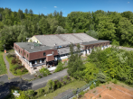 Drohnenaufnahme ehemaliges Hotel - Attraktives Baugrundstück in Bestlage von Ransbach-Baumbach – Planungsvorschlag für 69 Wohneinheiten