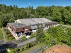 Drohnenaufnahme ehemaliges Hotel - Attraktives Baugrundstück in Bestlage von Ransbach-Baumbach – Planungsvorschlag für 69 Wohneinheiten