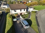 Außenansicht - gepflegtes Einfamilienhaus auf großem Grundstück mit Garage und Fernsicht!