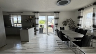 Wohn- /Esszimmer mit Terrasse EG - Ihr neues Zuhause am Ortsrand – modernes Massivhaus mit Kamin & sonnigem Garten