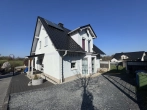 3029101 - Ihr neues Zuhause am Ortsrand – modernes Massivhaus mit Kamin & sonnigem Garten