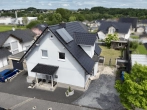 Außenansicht - Ihr neues Zuhause am Ortsrand – modernes Massivhaus mit Kamin & sonnigem Garten