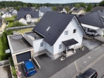 Außenansicht - Ihr neues Zuhause am Ortsrand – modernes Massivhaus mit Kamin & sonnigem Garten