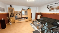 Wohnzimmer - Gepflegte Erdgeschosswohnung mit ca. 62 m² Wohnfläche und eigenem Stellplatz
