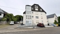 Außenansicht - Gepflegte Erdgeschosswohnung mit ca. 62 m² Wohnfläche und eigenem Stellplatz