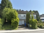 Außenansicht - Einfamilienhaus mit Garage auf großem Grundstück in schöner Lage