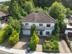 Außenansicht - Einfamilienhaus mit Garage auf großem Grundstück in schöner Lage