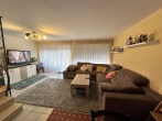 Wohnzimmer Wohnung 3 - Reihenhauskomplex mit Garagen und Stellplätzen nahe dem Ortsrand