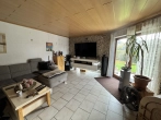 Wohnzimmer mit Terrasse - großzügiges Einfamilienhaus mit Einliegerwohnung und Stellplätzen