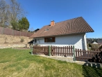 Garten mit Terrasse - Wohlfühl-Zuhause im Landhausstil – familienfreundliches Traumhaus mit Garten, Sauna & Kamin