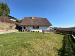 Garten mit Terrasse - Wohlfühl-Zuhause im Landhausstil – familienfreundliches Traumhaus mit Garten, Sauna & Kamin