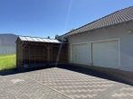 Doppelgarage und Holzunterstand - großzügiger Bungalow mit Doppelgarage in ruhiger Lage
