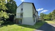 Außenansicht - gepflegte 3-Zimmer Eigentumswohnung im Zweifamilienhaus mit Balkon und eigenem Gartenbereich